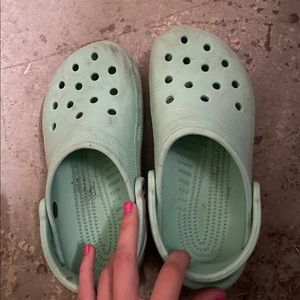 Bluish green crocs